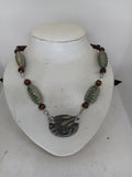 Woman's necklace/radiolaria pendant/chain: wood beads, cucaracha de mar, horn/ONLY 1/