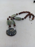 Woman's necklace/radiolaria pendant/chain: wood beads, cucaracha de mar, horn/ONLY 1/