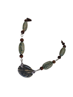 Woman's necklace/radiolaria pendant/chain: wood beads, cucaracha de mar, horn/ONLY 1/