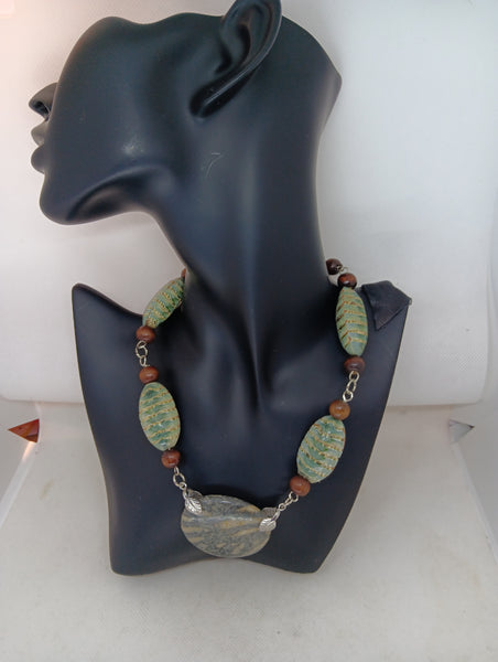 Woman's necklace/radiolaria pendant/chain: wood beads, cucaracha de mar, horn/ONLY 1/