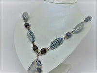 Woman's pendant necklace/HANDMADE: wood and horn beads, radiolaria pendant/avant garde/ONLY 1