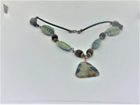 Woman's pendant necklace/HANDMADE: wood and horn beads, radiolaria pendant/avant garde/ONLY 1