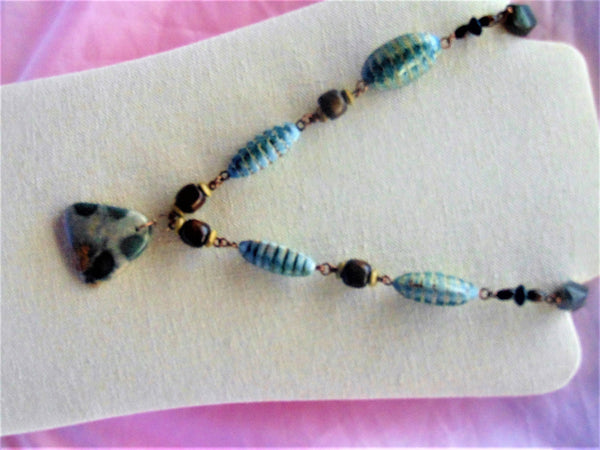 Woman's necklace/radiolaria pendant/chain: wood beads, cucaracha de mar, horn/ONLY 1/